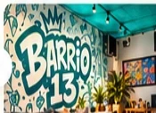 Artwork and seating inside Barrio 13